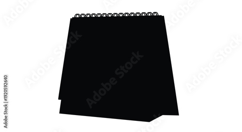 A black desk calendar is displayed opened to the month of january 2024