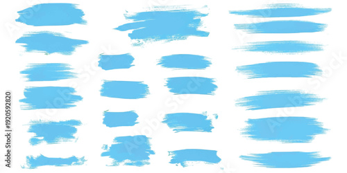 A collection of various light blue paint brush strokes in a grunge style on a white background