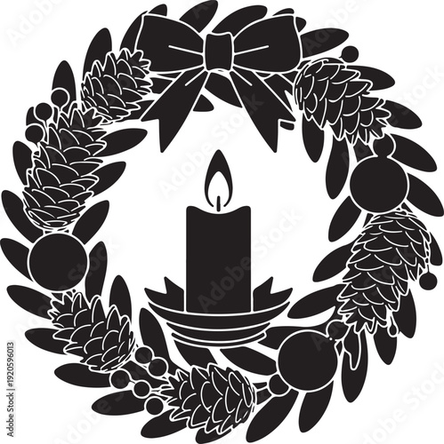 Black and white wreath with lit candle flame pinecones