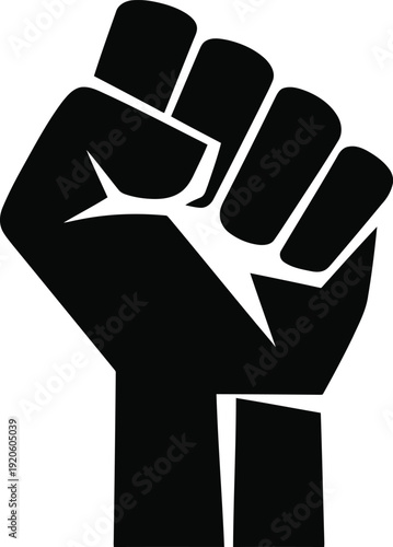A black and white image of a raised fist
