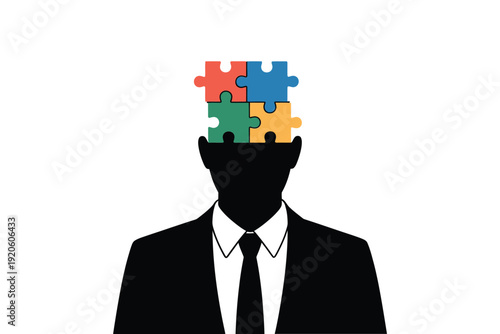 A silhouetted head with puzzle pieces representing thought and problem solving