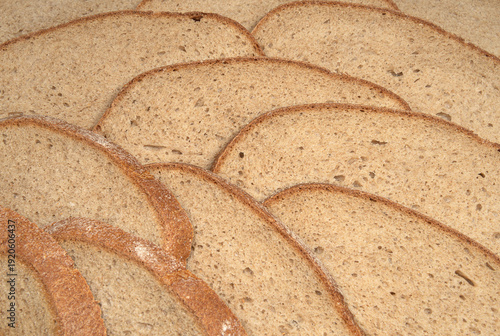 Slices of dark rye bread as a background