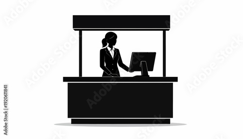 Woman working at a ticket booth or information desk.