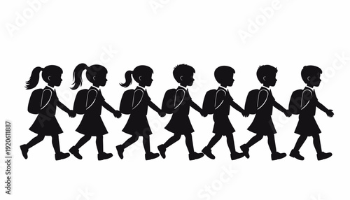 Group of school children walking together in uniform holding hands.