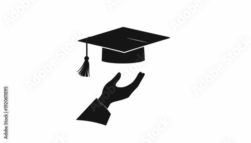 Hand catching graduation cap in mid-air, symbolizing achievement and education.