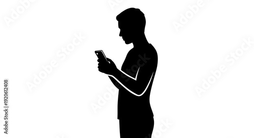 Silhouette of a man using a mobile phone in profile.