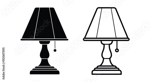 Two contrasting table lamps one black one white in simple outline