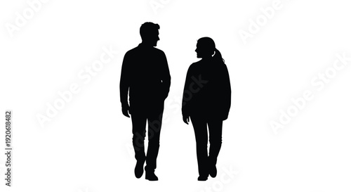 Silhouettes of a man and woman standing close together
