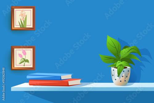 Minimalist Workspace Background with Blue Wall, Houseplant in Spotted Pot and Botanical Art Frames