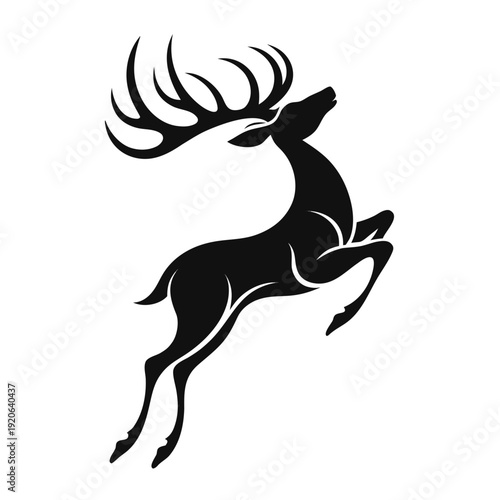 Majestic deer jumping with large antlers in mid-air
