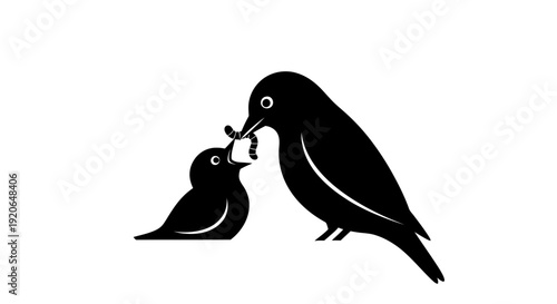 Mother Bird Feeding Her Young Chick with Worm.