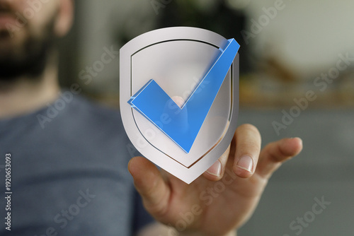 A person holding a shield w...