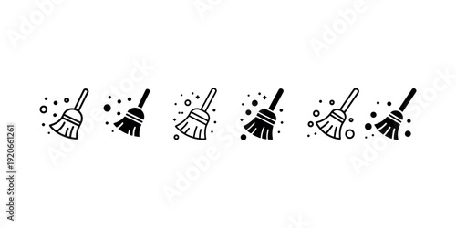 Broom icon set with cleaning dust particles isolated on white background vector illustration representing housework equipment and domestic hygiene service
