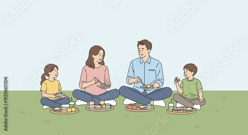 Happy Family Enjoying A Delicious Picnic On A Sunny Day