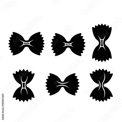 Black Farfalle Pasta Shapes Isolated on White Background, Top View