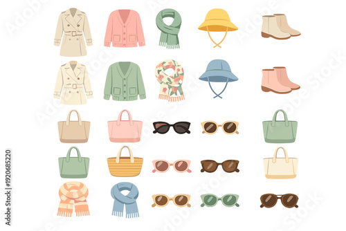 Various clothing and accessory items laid out on a flat surface for seasonal fashion choices in a store or design studio