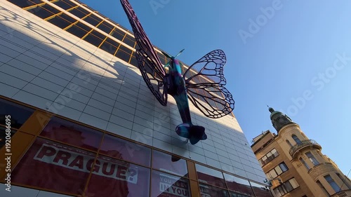 Large Blue Butterfly Sculpture Attached to the Modern Quadrio Shopping Center Facade, Prague, Czechia