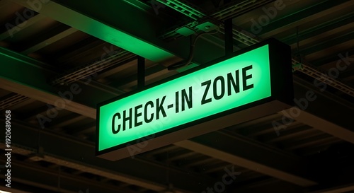 Green illuminated check-in zone sign hanging from ceiling green sign airport