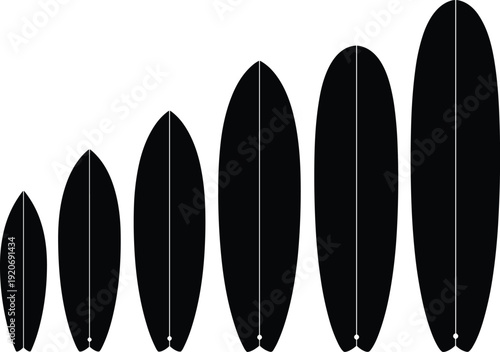 Black surfboards of different sizes on white background surfboard shapes