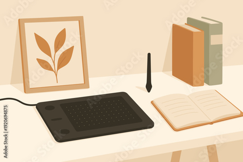 Workspace with drawing tablet, books, and plant art on a desk during daytime in a simple design setting