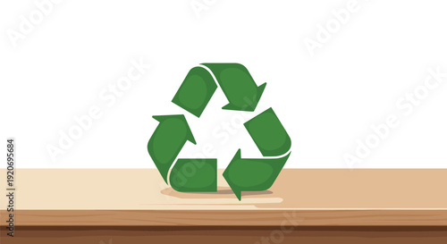 A green recycling symbol with arrows is prominently displayed on a light brown wooden table.