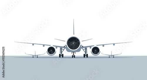 A large passenger jet is parked on an airport tarmac, viewed from the rear, flanked by two smaller airplanes.