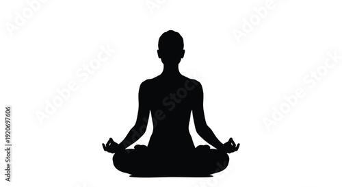 Woman meditating in lotus position a striking black silhouette