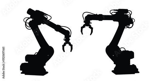 Two industrial robotic arms facing each other black silhouette