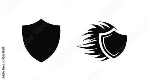 Two heraldic shields in black one with wings a striking silhouette
