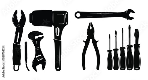 Black silhouette tools icons set including wrench, pliers, screwdrivers, and hammer on white background for repair, construction, and DIY concept