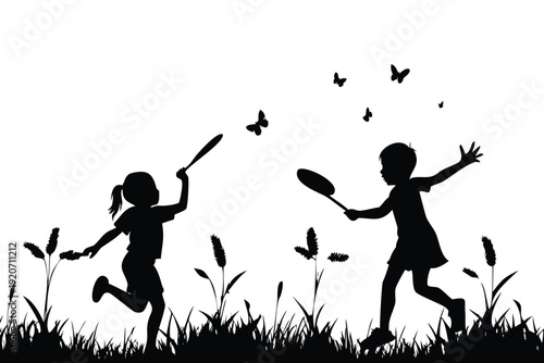 Silhouette of two children playing badminton in a grassy field with butterflies Easter Sunday silhouette children playing