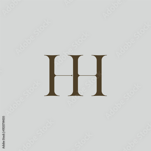 Elegant interlocking HH monogram emblem minimalist abstract logo design suited for luxury branding, fashion, stationery, packaging, corporate identity and creative projects.