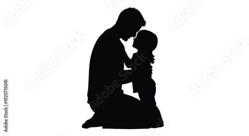 A father kneels tenderly embracing his young child a striking silhouette