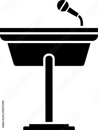 Black and white podium with microphone on top