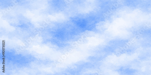 A beautiful blue summer sky is filled with fluffy white cumulus clouds, creating a clear natural atmosphere in this bright sunny cloudscape