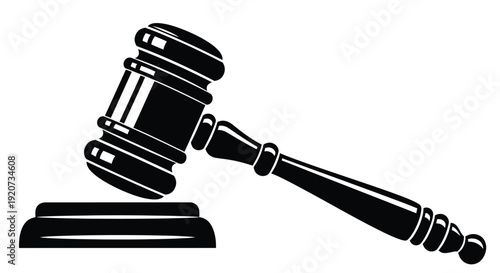 The gavel rests upon a sound block for legal judgment decree.