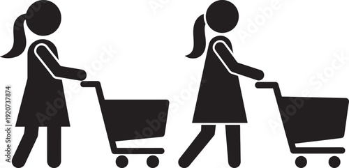 Two women push shopping carts