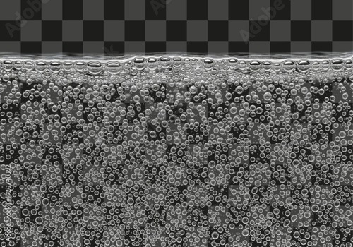 Detailed shot of shiny gas bubbles in a transparent fluid against a dark background