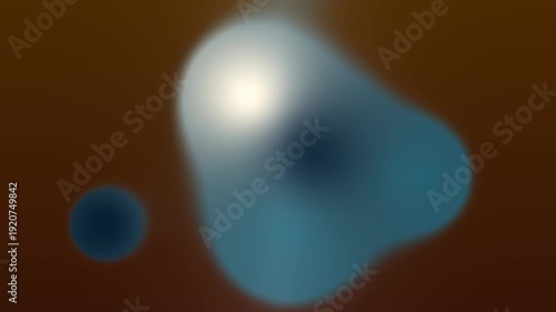 Abstract blurred shapes with a brown background and bright light.