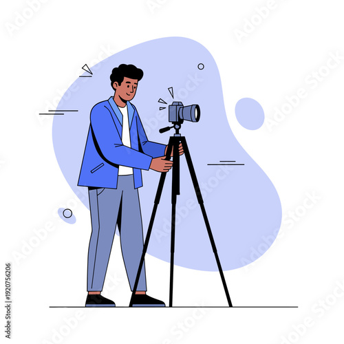 Young african male photographer adjusting camera on tripod