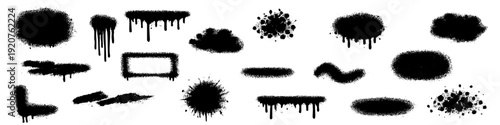 Set of black graffiti spray paint splatters and dripping ink stains isolated on white background.