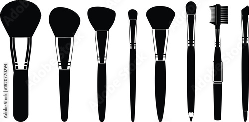 Collection of makeup brushes on a white background