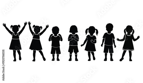A group of happy children in various playful poses in black silhouette