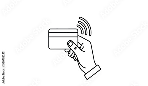 A hand holding a credit card with wireless signal icon above it
