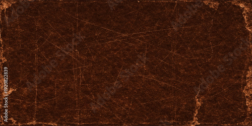A dark brown vintage leather texture background with a rough grunge pattern and macro paper surface design for a natural old material backdrop
