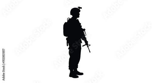 Soldier standing with rifle a stark black silhouette