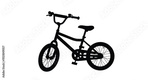 A black silhouette of a child s bicycle against a white background silhouette