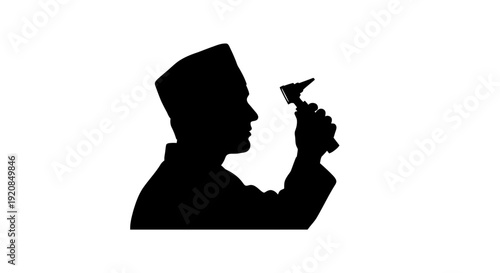 Silhouette of a medical professional holding a penlight, ideal for healthcare and diagnostic themes