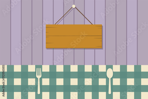 Blank wooden sign hanging on purple wall above green checkered tablecloth with fork and spoon