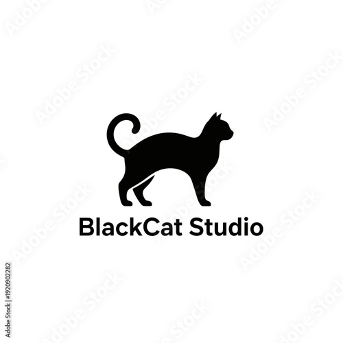A black silhouette of a cat is standing with a curved tail, atop simple sans-serif text below